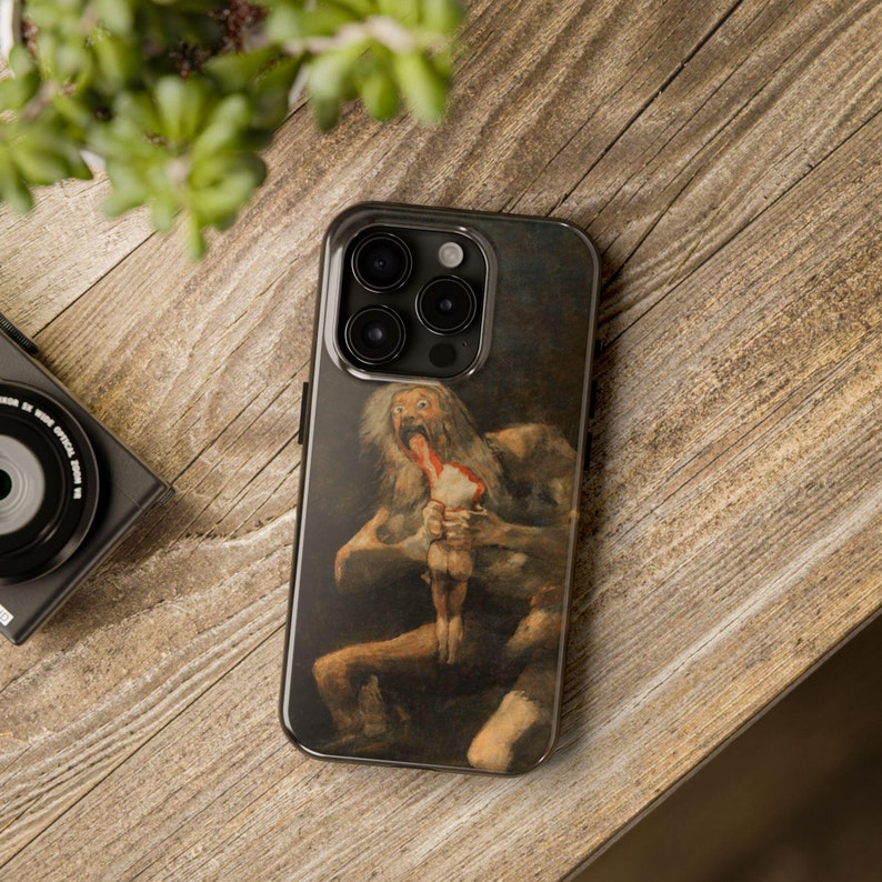 iPhone case featuring Goya's 'Saturn Devouring His Son,' printed with vivid detail. Made from durable materials, it protects your phone from scratches and damage. A perfect gift for art lovers or anyone seeking a unique, artistic phone accessory.