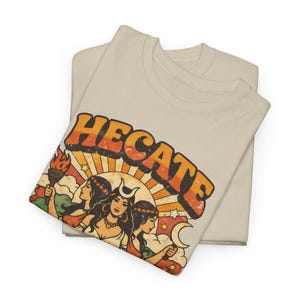 Vintage 70s Hecate retro shirt featuring the Triple Goddess in a mystical boho design, inspired by witchcraft, Wiccan and pagan spirituality. This witchy graphic tee shows Hekate with moon phases and occult symbols, perfect for spiritual women, witches, and lovers of magic. Ideal witchy gift for Wiccan, pagan and boho aesthetic fans.
