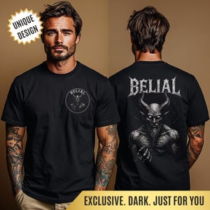 May include: Black t-shirt featuring a demonic illustration. The front displays a circular design with the word "BELIAL" and a horned figure. The back of the shirt has the word "BELIAL" above a detailed image of a demon. The shirt has the text "UNIQUE DESIGN" and "EXCLUSIVE. DARK. JUST FOR YOU".