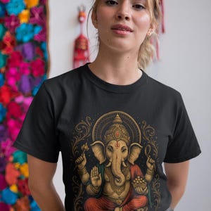 Spiritual Ganesha T-shirt featuring Hindu Elephant God design. Perfect for yoga, meditation, and spiritual gifts. Boho Indian graphic tee celebrating divine feminine energy and peaceful vibes.