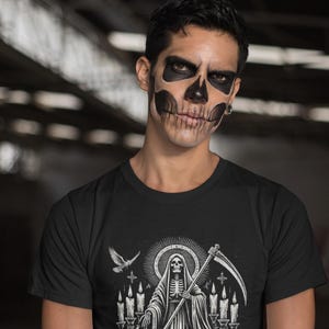 Santa Muerte Gothic Shirt - Holy Death T-Shirt featuring Day of the Dead skull design. Perfect Mexican folk art skeleton top for Dia de los Muertos celebrations or as a unique gift idea. Stylish and symbolic gothic tee for fans of Santa Muerte.