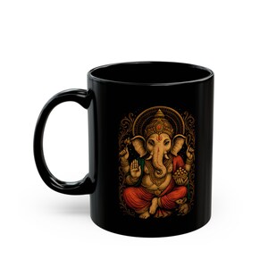 Black Ganesha Mug featuring Hindu Elephant God design, perfect for yoga lovers and spiritual gifts. Boho Indian graphic print. Available in 11oz and 15oz sizes. Ideal for tea or coffee, a unique addition to your collection