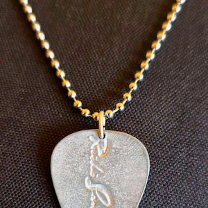 Bon Jovi Richie Sambora pendant with zamak pick and leather rope, 48 cms. LAST UNITS!!
