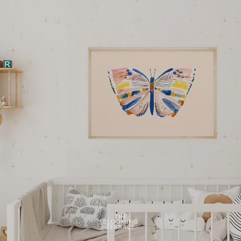 Hand-painted butterfly with bold brushstrokes in orange, pink, blue, and yellow on a soft peach background. Colorful whimsical digital wall art, perfect for nursery, kids’ bedroom, or playful spring decor.