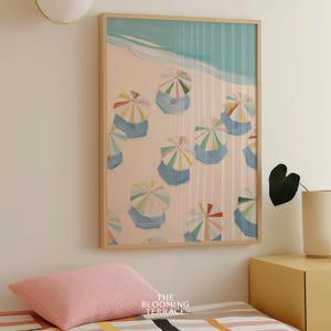 Vibrant pastel painting of colorful beach umbrellas arranged neatly on a sandy shore near the ocean. The artwork features soft hues of blue, green, pink, yellow, and red under a turquoise sea and a serene sky, creating a calm, tropical and coastal atmosphere perfect for summer and seaside decor.