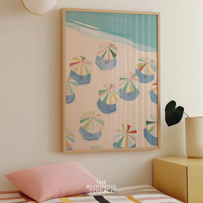 Vibrant pastel painting of colorful beach umbrellas arranged neatly on a sandy shore near the ocean. The artwork features soft hues of blue, green, pink, yellow, and red under a turquoise sea and a serene sky, creating a calm, tropical and coastal atmosphere perfect for summer and seaside decor.