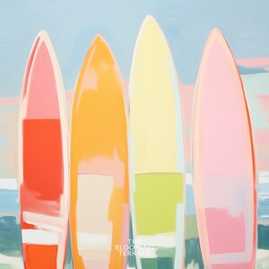 Digital wall art of four colorful surfboards in shades of coral, orange, yellow, and pink standing on a beach — perfect printable art for coastal or summer home decor.