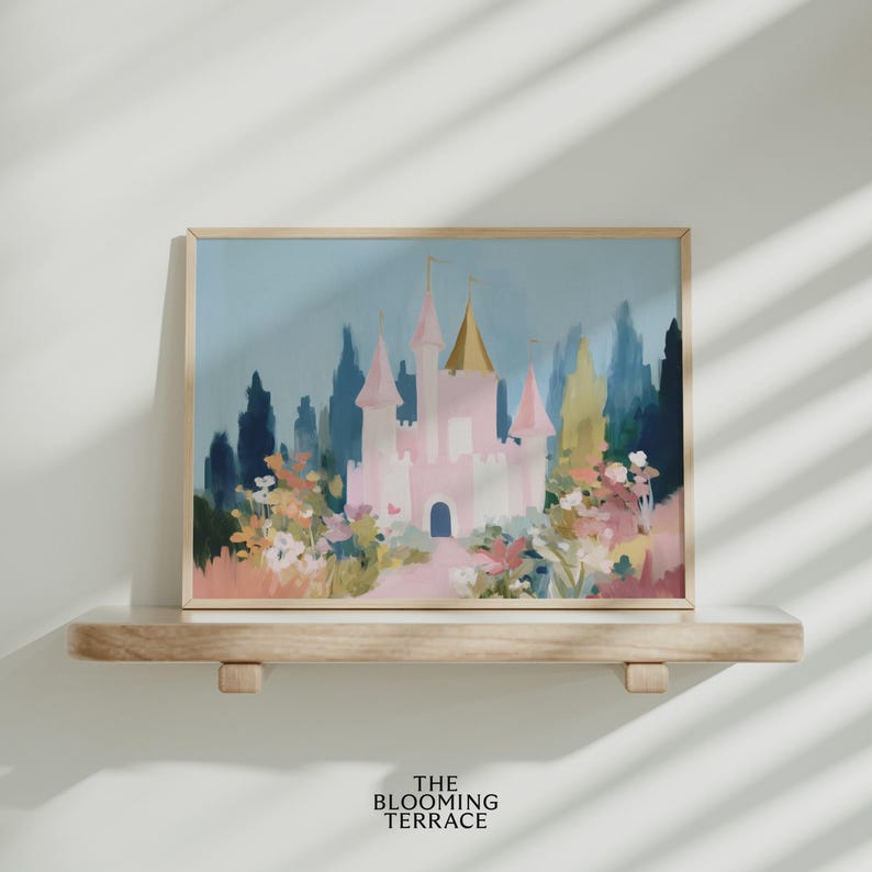 Whimsical pink fairytale castle with golden spires surrounded by colorful flowers and greenery, set against a dreamy blue sky. Digital download wall art perfect for nursery, girls bedroom, or princess-themed decor.