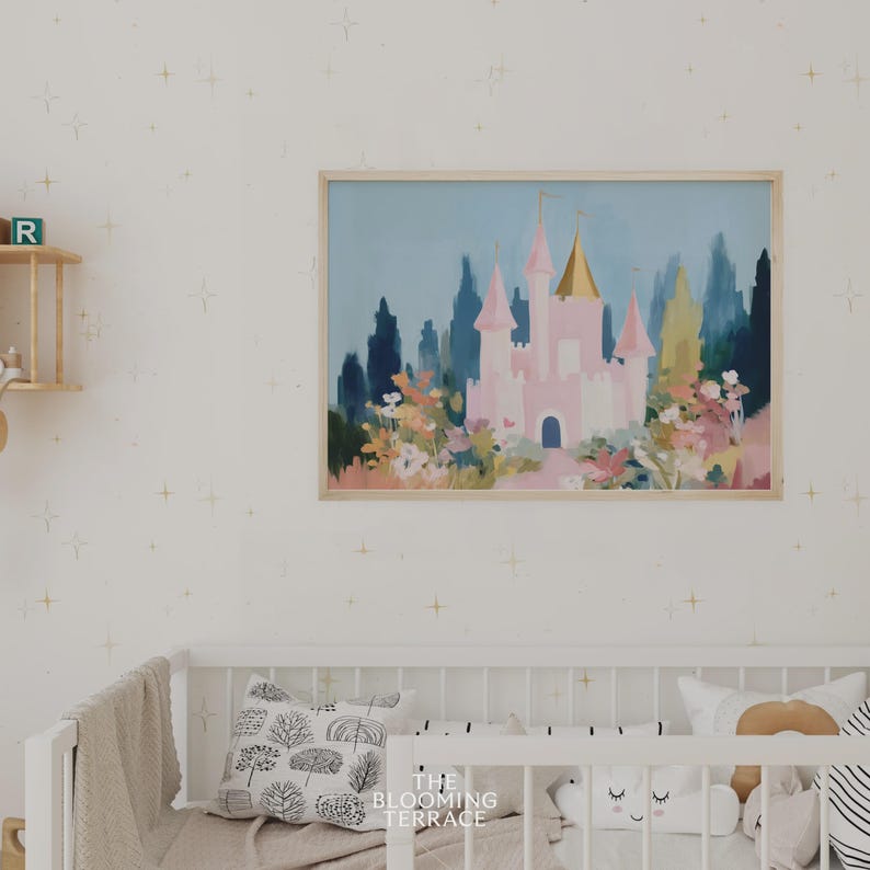 Whimsical pink fairytale castle with golden spires surrounded by colorful flowers and greenery, set against a dreamy blue sky. Digital download wall art perfect for nursery, girls bedroom, or princess-themed decor.
