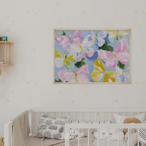 Colorful pastel butterflies in pink, yellow, lavender, and white with painterly brushstrokes on a light blue background. Whimsical digital download wall art, perfect for nursery, girls bedroom, or springtime decor.