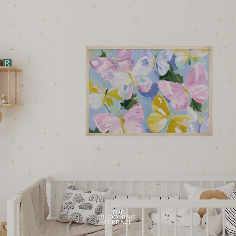 Colorful pastel butterflies in pink, yellow, lavender, and white with painterly brushstrokes on a light blue background. Whimsical digital download wall art, perfect for nursery, girls bedroom, or springtime decor.