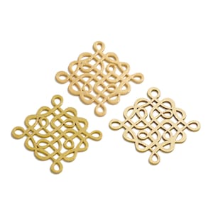 May include: Three gold metal decorative pieces with an intricate knot design. Each piece is square shaped and has a delicate, openwork pattern.