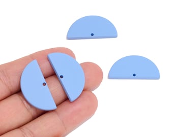 May include: Three light blue, semi-circle shaped components with a smooth, matte finish. Each piece features a single, small, centered hole near the flat edge, designed for threading or attachment in jewelry making or craft projects.