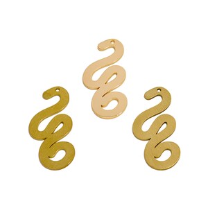 May include: Three gold-coloured metal charms shaped like a stylised letter 'S'.