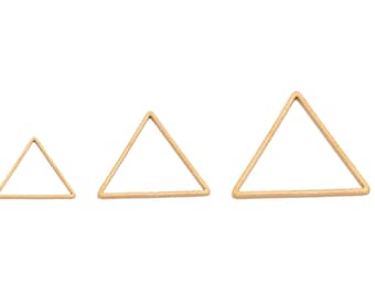 May include: Three gold triangle shapes of different sizes. The triangles are made of metal and have a smooth, polished finish.