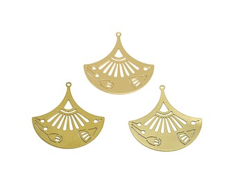 May include: Three gold metal fan-shaped charms with intricate cut-out designs. The charms have a hole at the top for attaching to jewelry or other crafts.