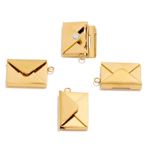 May include: Four gold-colored envelope charms with a hinged opening. The charms are designed to look like envelopes and have a small loop at the top for attaching to a necklace or bracelet.