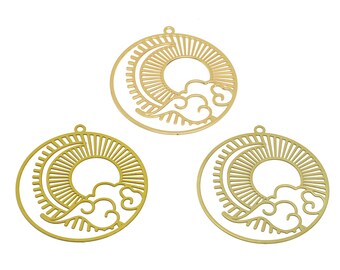 May include: Three gold metal charms with a sun, moon, and cloud design. The charms are round and have a cutout design.