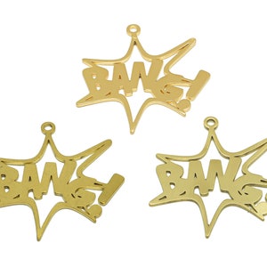 May include: Three gold-colored metal charms shaped like a starburst with the word "BANG!" in a comic book style font.