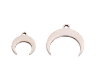 May include: Two silver crescent moon charms with a hole at the top for attaching to jewelry or other crafts.