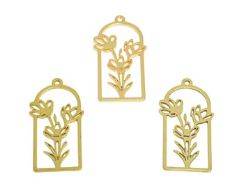 May include: Three gold metal charms with a floral design. Each charm features a stylized flower with three blooms inside a rectangular frame with an arched top.