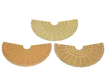 May include: Three metal fan-shaped embellishments with a decorative design. The embellishments are gold, copper, and a lighter gold color.