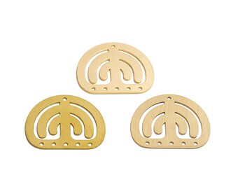May include: Three gold-colored metal charms shaped like a stylized tree with a rounded top and a series of rounded arches. The charms have a smooth, polished finish.