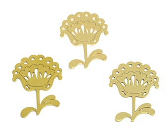 May include: Three gold metal flower-shaped charms with intricate cut-out designs. The charms are approximately 2 inches in size.