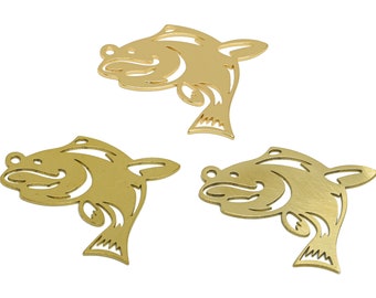 May include: Three gold metal fish charms with a cutout design. The charms are approximately 2 inches long and 1 inch wide.
