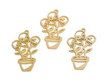 May include: Three gold-colored metal charms shaped like a potted plant with three skulls as the flowers. The charms are perfect for jewelry making or scrapbooking.