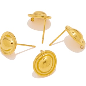 May include: Four gold-toned earring posts with a round, domed top. The posts are arranged in a circle on a white background.