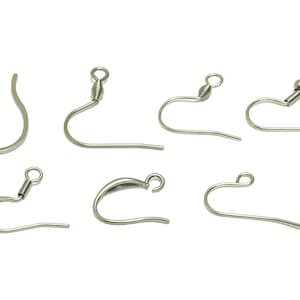 May include: Assortment of silver earring hooks, including a variety of styles with and without decorative elements.
