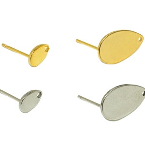 Peut inclure: Deux paires de supports de boucles d'oreilles, une paire est dorée et l'autre est argentée. Chaque support est en forme de larme avec un trou en haut pour fixer une attache.