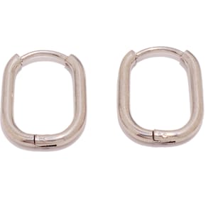 May include: A pair of silver hoop earrings with a rectangular shape.