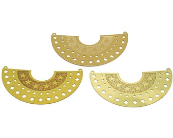 May include: Three gold metal decorative pieces in the shape of a half-circle with a star design. The pieces are cut out with a geometric pattern.