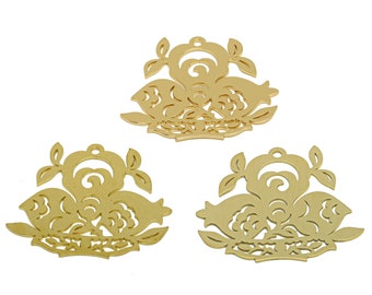 May include: Three gold-colored metal filigree pendants with an ornate floral design. Each pendant features a central swirl, floral elements, and a small loop for hanging. The pendants are ideal for jewelry making or crafting.