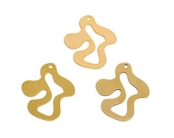 May include: Three gold-colored metal charms in the shape of an abstract, irregular blob. Each charm has a hole at the top for attaching to a necklace, bracelet, or other jewelry.