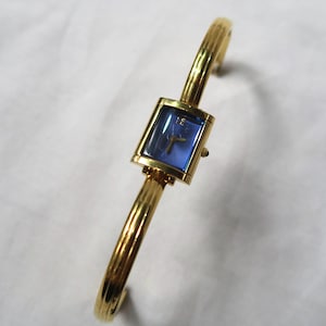 Yves Saint Laurent gold Bangle Vintage stunning women&#39;s watch