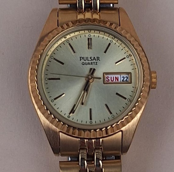 Lady's Pulsar Quartz Watch PXX004 - Round Champagne Dial - Day and