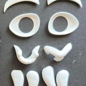 Sabertooth | Homotherium | Feline Fursuit Accessories | 3D Printed in PLA | Includes Eye Blanks, Eyelids, Teeth, and Nose