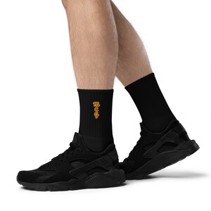 Metro Coffin Gear Embroidered socks 80% cotton, 17 polyester, 3 spandex Cushioned sole Machine washable