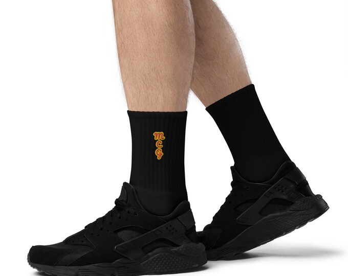 Metro Coffin Gear Embroidered socks 80% cotton, 17 polyester, 3 spandex Cushioned sole Machine washable