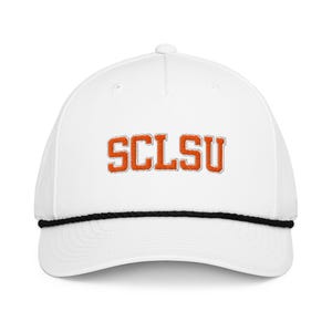 May include: A white baseball cap with the orange letters "SCLSU" embroidered on the front. The letters have a white outline. The cap has a black rope detail around the brim.