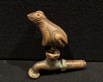 Vintage Victorian era decorative spigot.