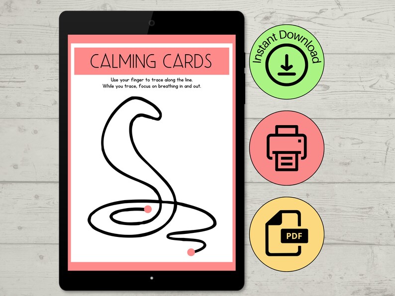 May include: A digital tablet displays a "CALMING CARDS" printable. The white page features a black line drawing and instructions. Icons for instant download, printing, and PDF format are visible.