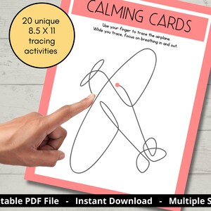 May include: A white paper with a pink border features a black line drawing of an airplane. The text "CALMING CARDS" is at the top. A hand points to the airplane. The paper is 8.5 x 11 inches and has 20 tracing activities.