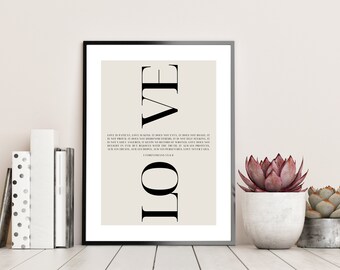 May include: A black and white printable wall art print with the word "LOVE" in large letters and a Bible verse about love from 1 Corinthians 13:4-7. The print is on a beige background and is framed in a black frame.
