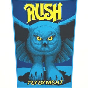 RUSH - Fly By Night - Patch traseiro tecido com borda azul - Produto oficialmente licenciado - Edição limitada a 25 unidades - Esgotado - Venda direta