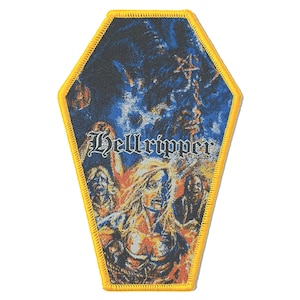 May include: A coffin-shaped patch with a yellow border. The patch features a detailed illustration in shades of blue, orange, and white. The word "Hellripper" is printed across the center. The artwork depicts a demonic scene with figures and a pentagram.