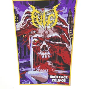 May include: A purple and yellow embroidered patch with a skull and a bloody scene. The text "DUCK FACE KILLINGS" is at the bottom of the patch.